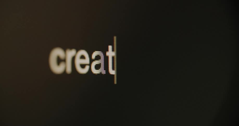 Cursor blinks on a screen as the word creativity is written