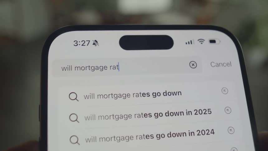Searching on cell phones search bar about mortgage rate drops