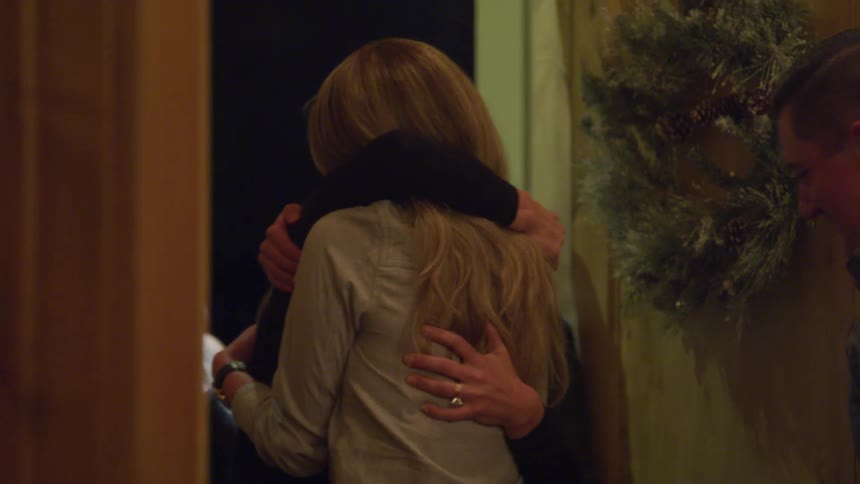 Group of friends greeting and hugging each other