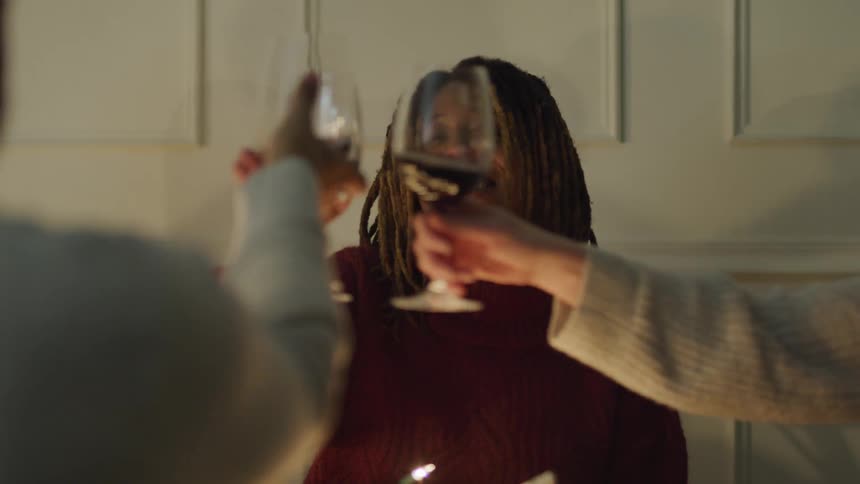 People toasting glasses of wine