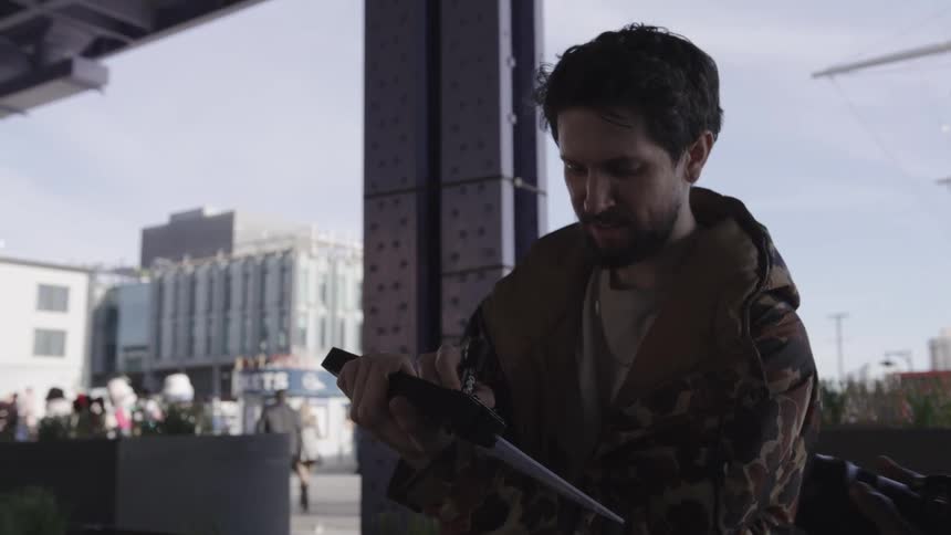 Man taking notes while on a recording set