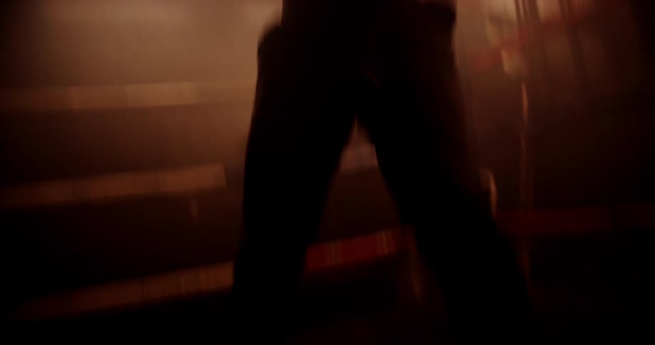 A boxer shadowboxing in a ring
