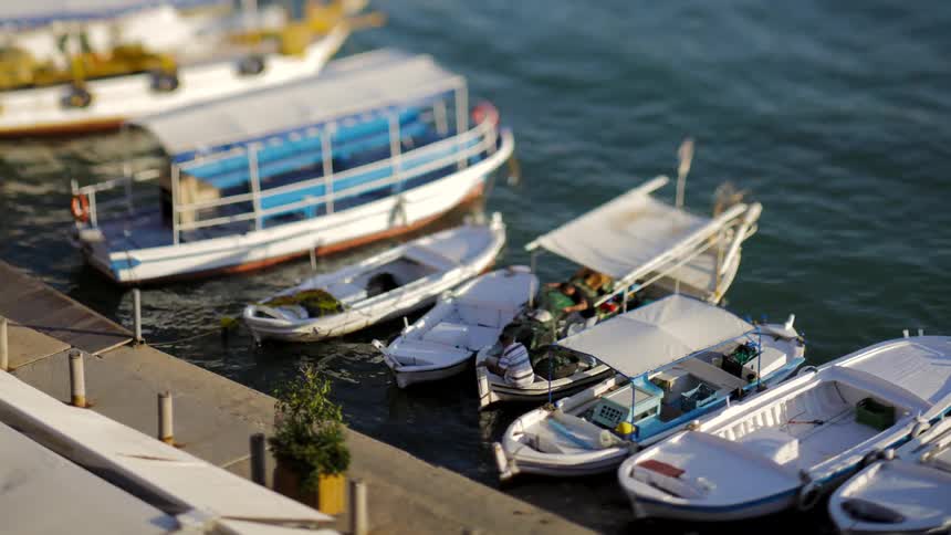 A boat docks at the harbor