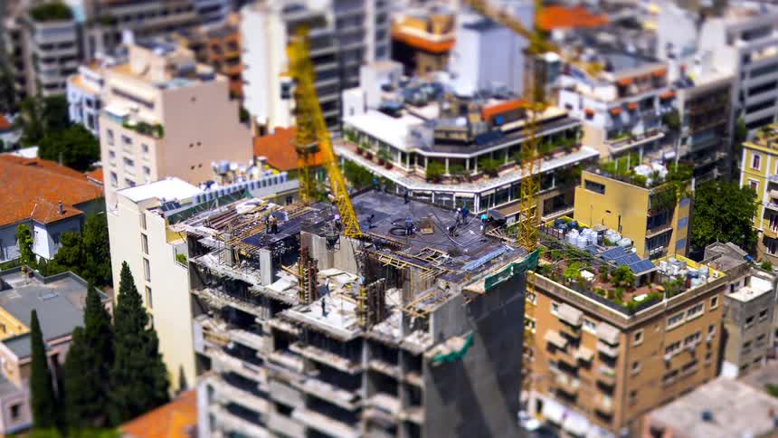 Construction workers are building a multi story building