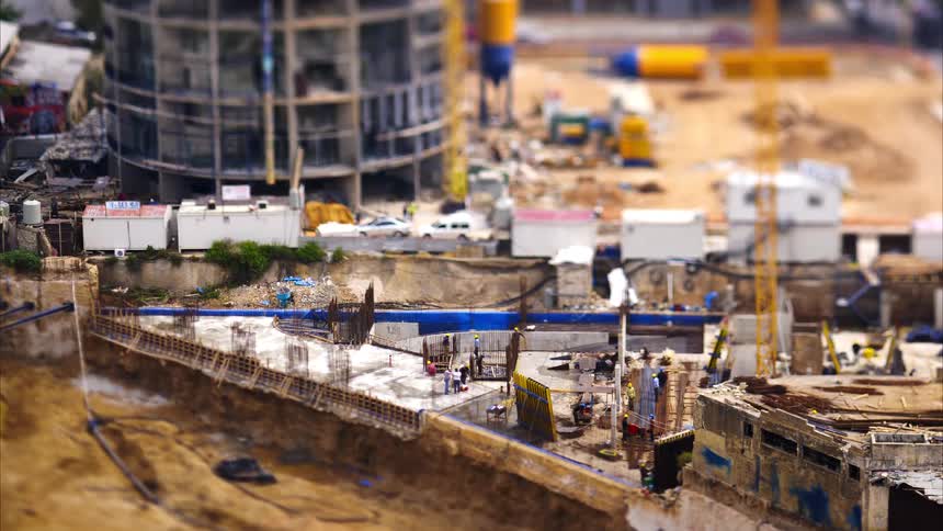 Construction workers are building in the city