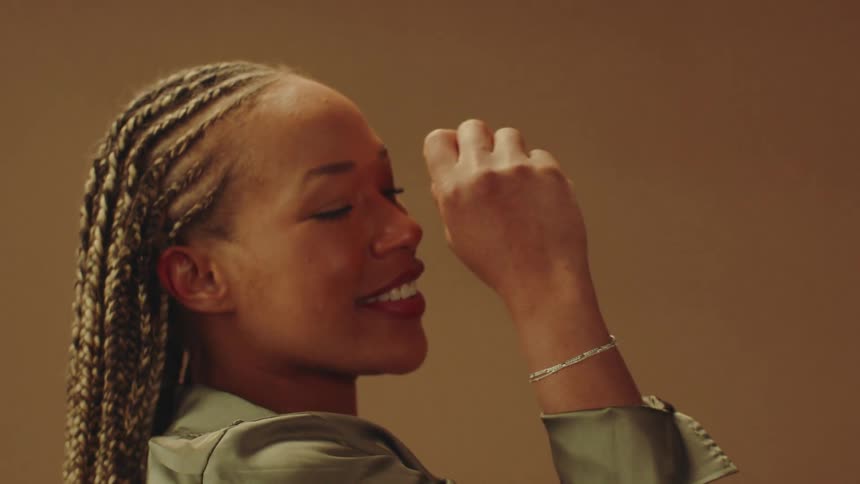 A woman is modeling a bracelet