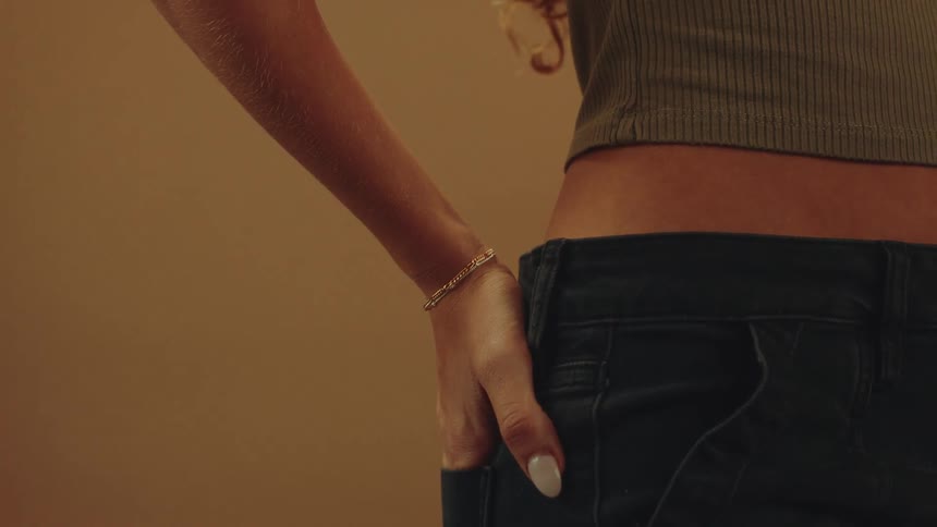 A woman is modeling a bracelet