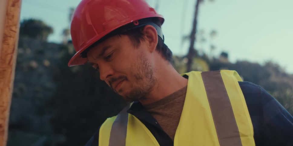 A worker is nodding his head
