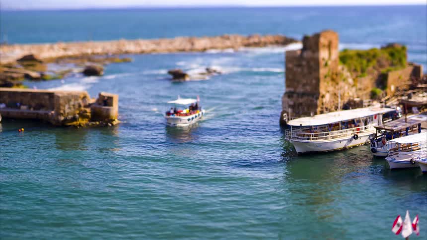 A boat is taking tourists around the water