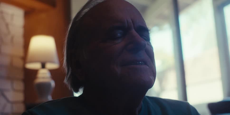 A man is meditating and breathing deeply