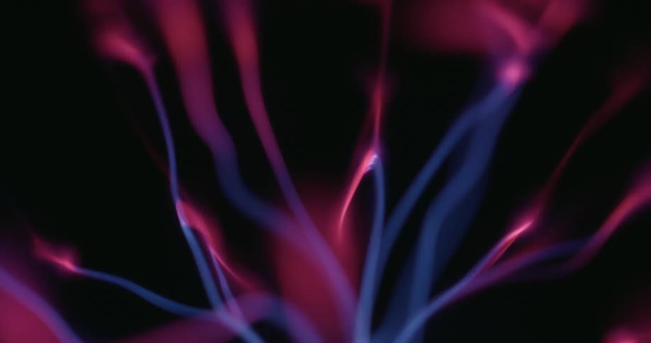Close up of abstract blue and purple colored magnetic waves