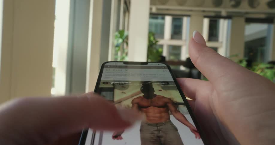 A person scrolling on their phone