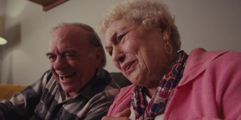 Portrait of an elderly couple talking happily
