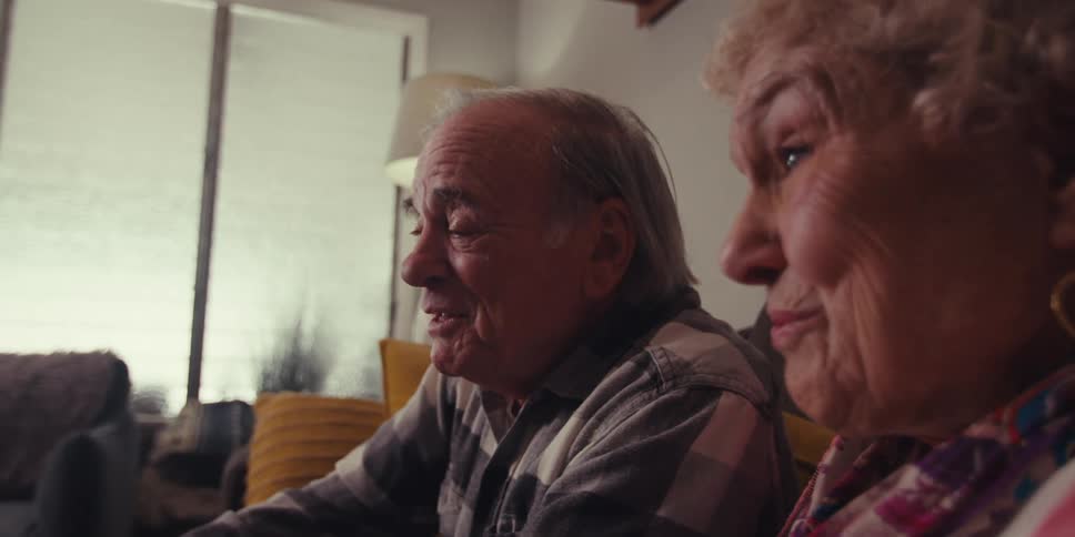 A footage of an elderly man and woman having a conversation