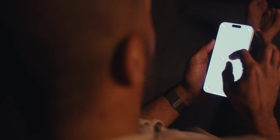 A footage of a person operating a smartphone