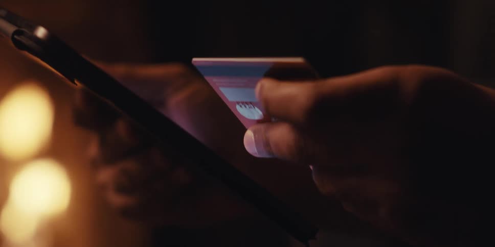 A person taps on a tablet