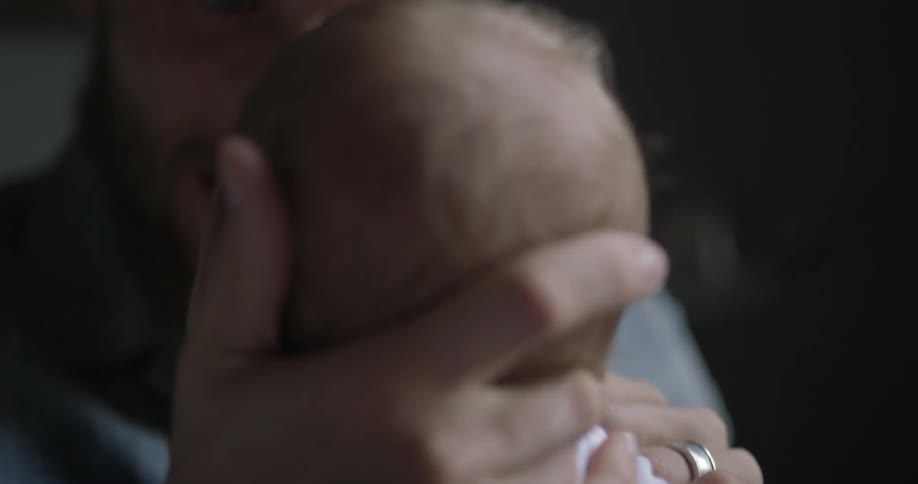 A person holding a baby