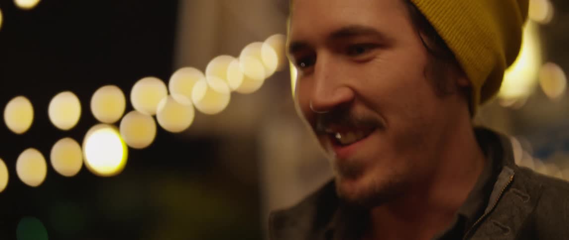 Man and woman talk and laugh