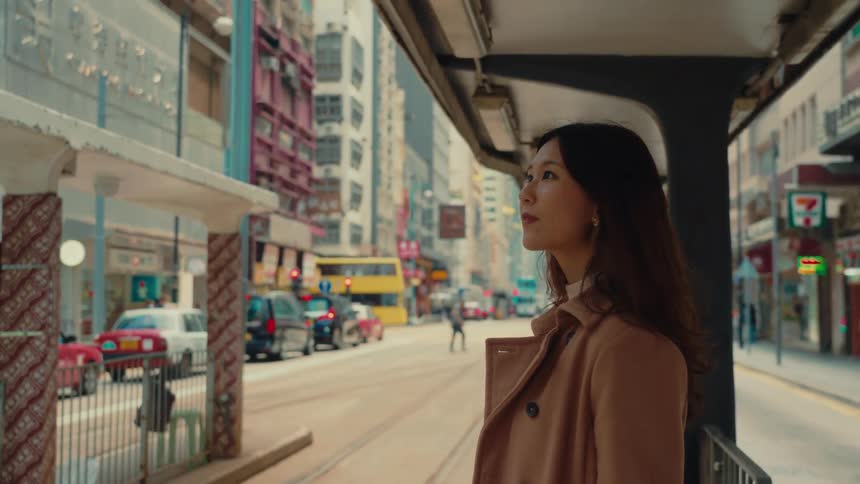 A footage of a lady standing at a terminal