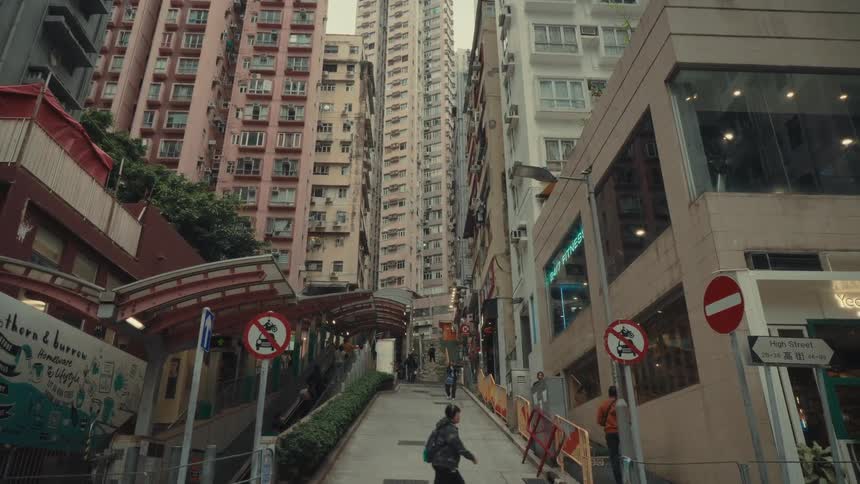 Glimpse of a busy city with people and buildings