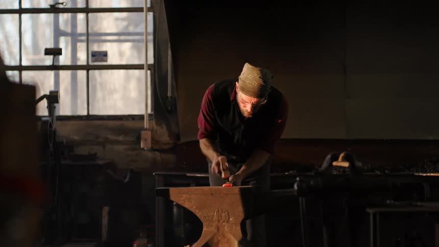 Man who works by beating iron