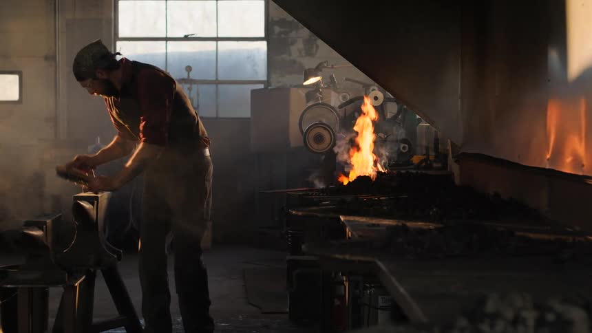 A footage of a blacksmith working