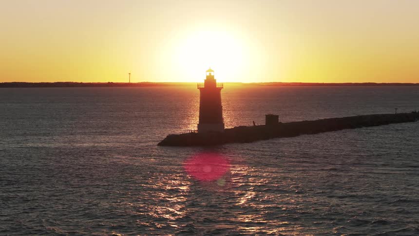 A lighthouse at sunset