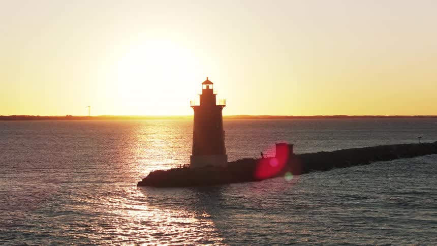 A lighthouse at sunset