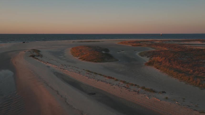 Waves wash up along the shore