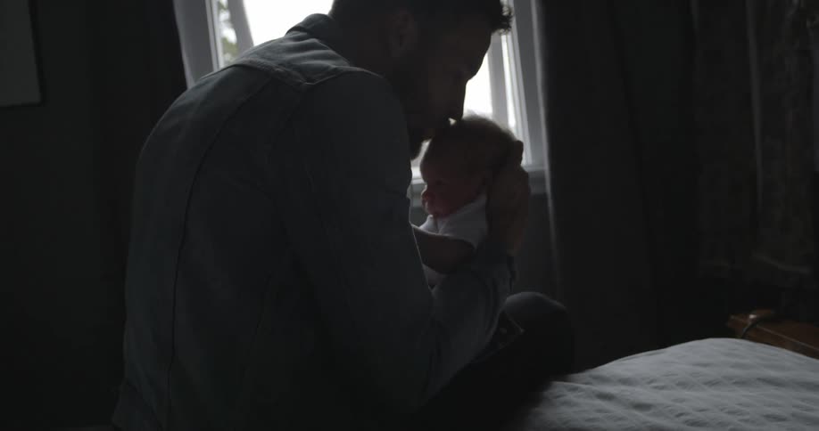 A person holding a baby