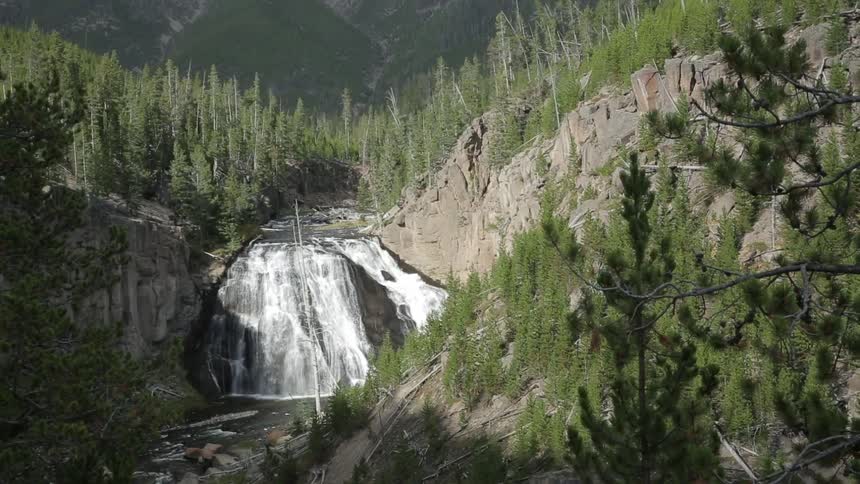 A waterfall rolling down a cliff side