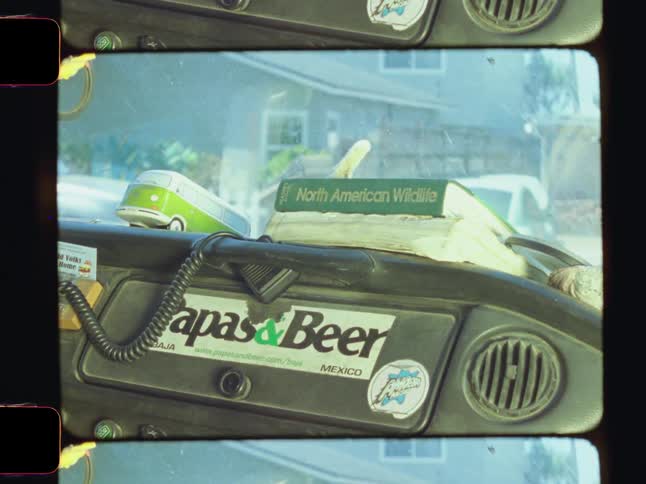 A book is on top of the vehicles glovebox