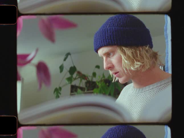 Boy looking around inside a room