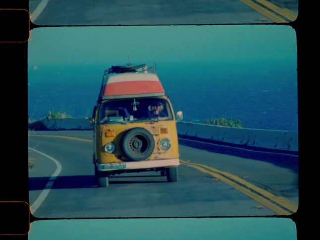 A footage of a yellow van moving on the freeway