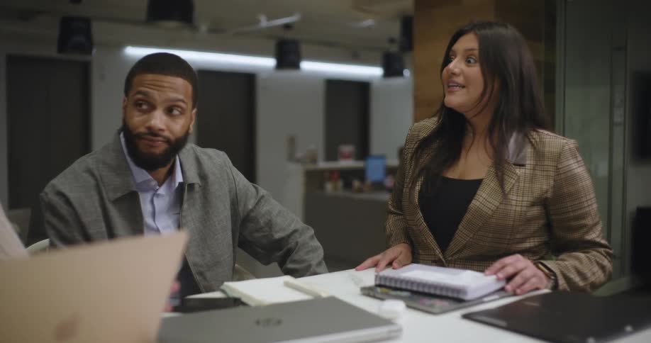 Guys talking in an office