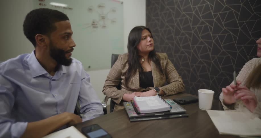 Guys talking in an office