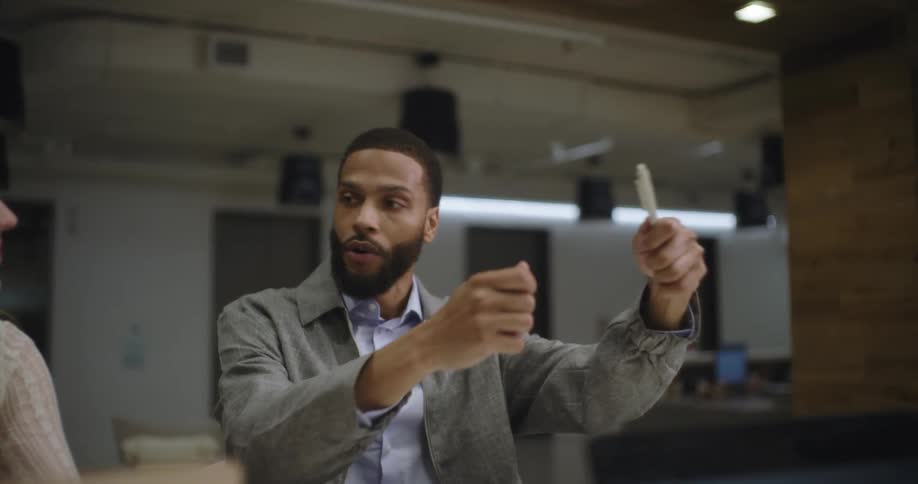 Guys talking in an office