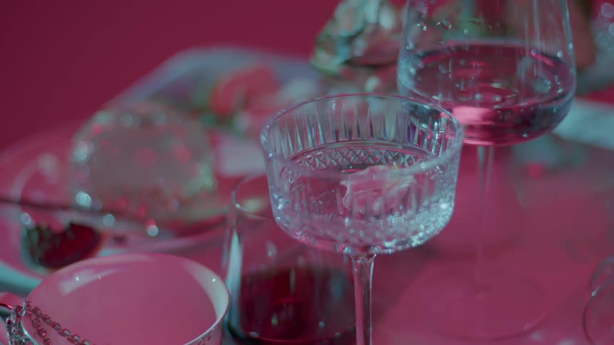 The glasses have some drinks in them