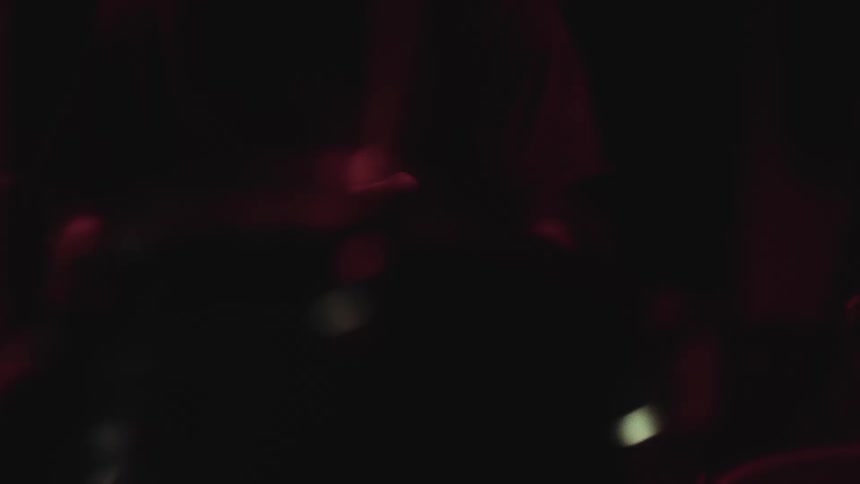 A man is playing the drums fast