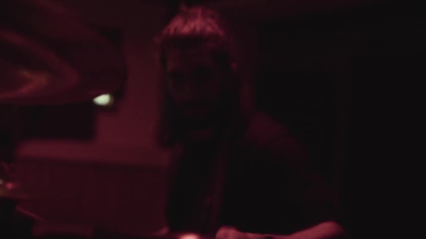 Boy playing drums