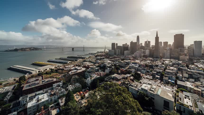 Clouds flow fast over the city