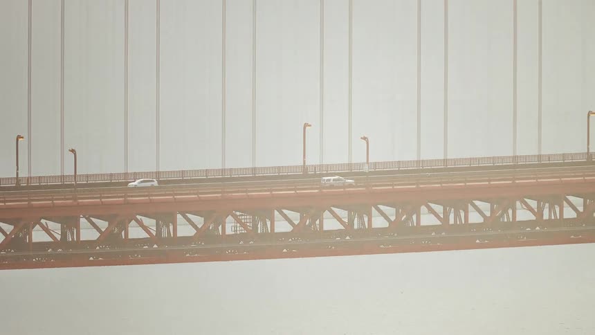 Car moving over a bridge