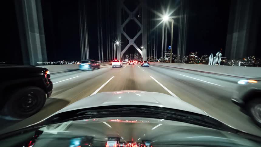 View from a car crossing a long bridge