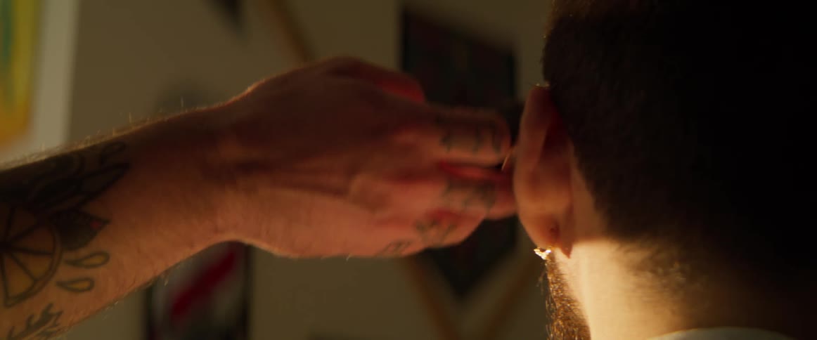 Boy whose hair is cut with a razor