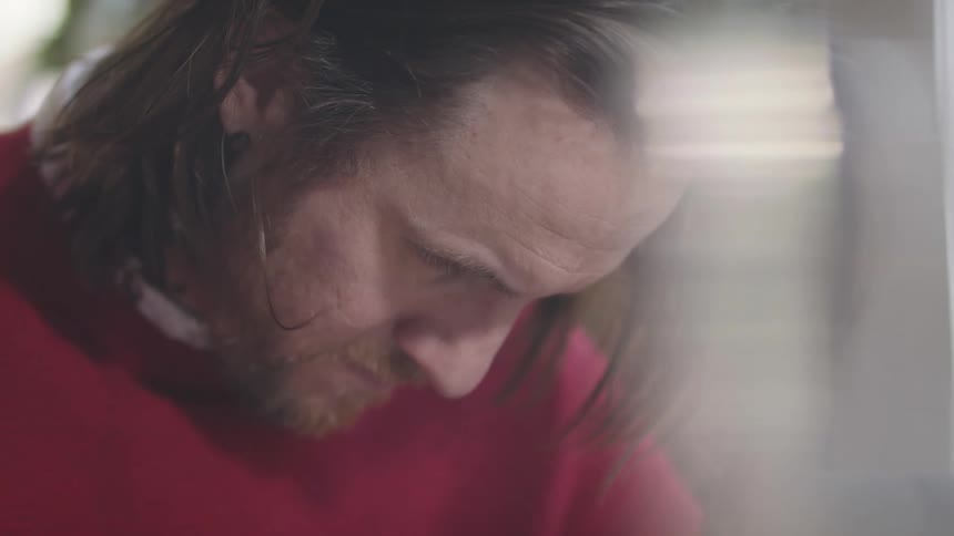 Man looking down focused on something