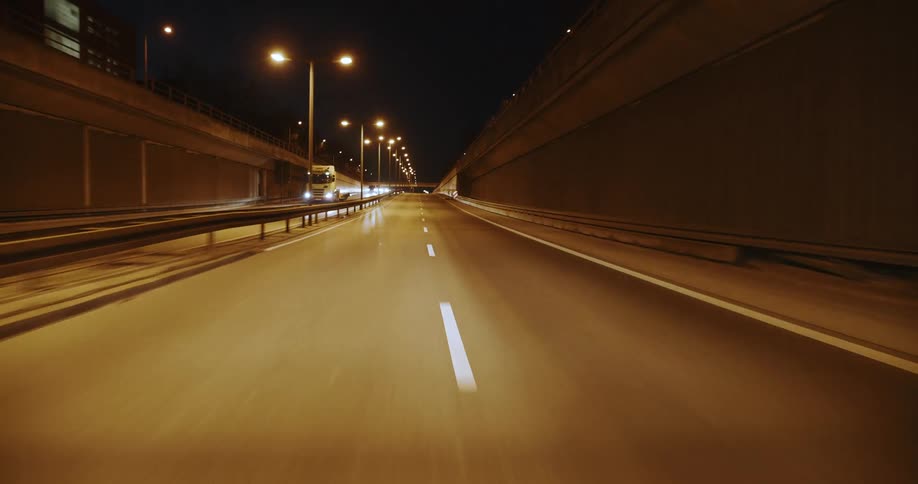 View of a road with a tunnel and then you can see the sky