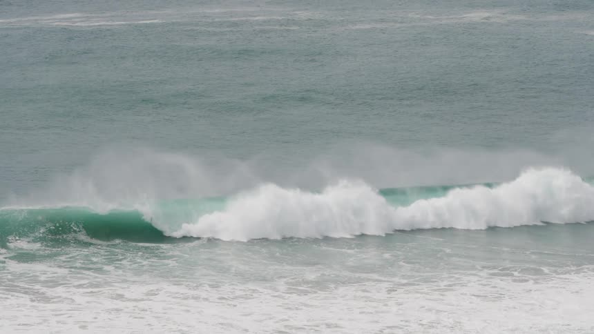 Waves crash on the beach