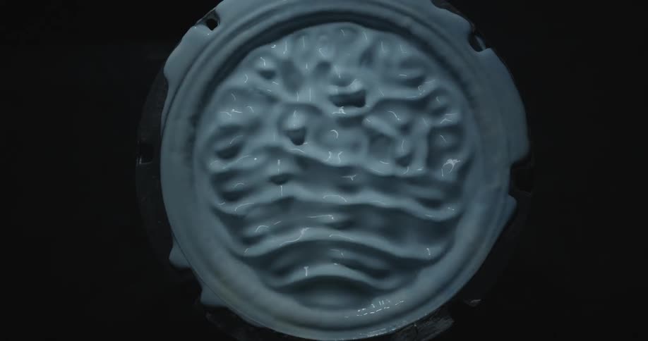 Paint in a bucket vibrating
