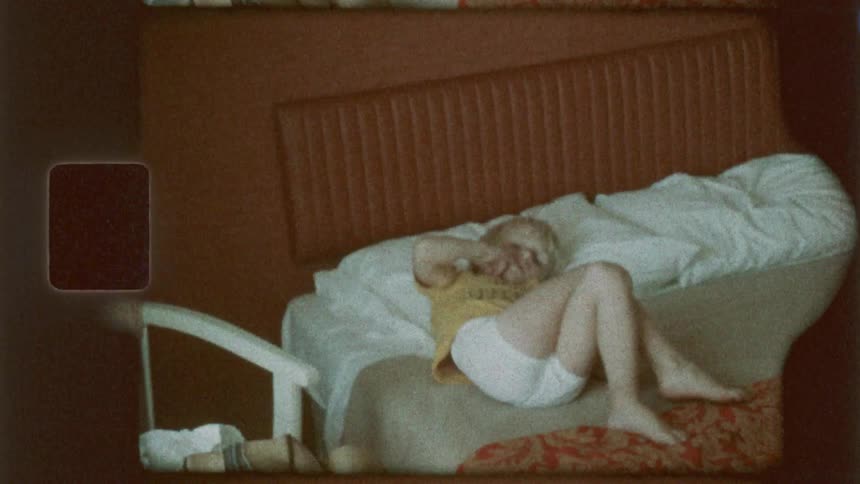 A child is resting in bed