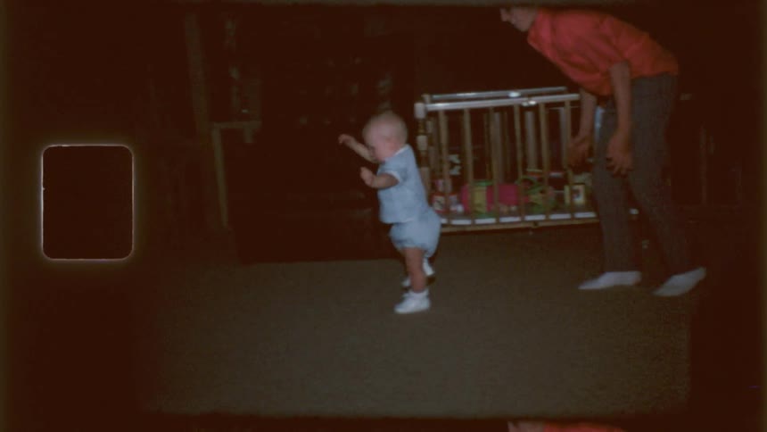 A baby trips and his mom catches him